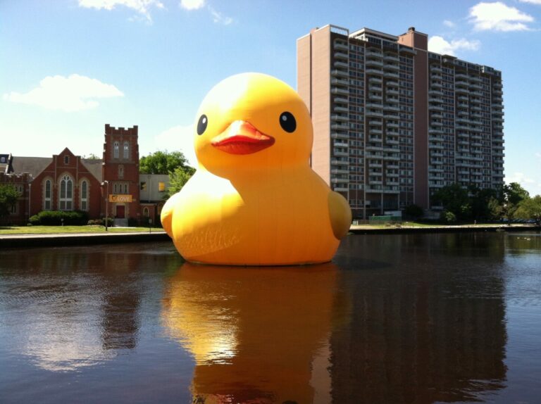 Gigantic rubber duck in a lake