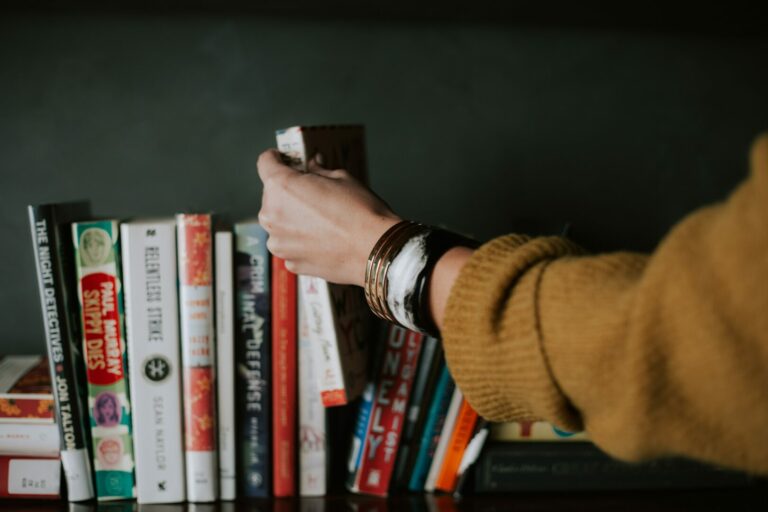 picking a book off a shelf