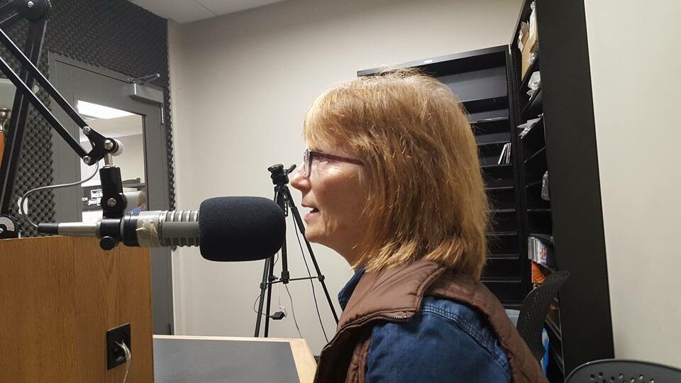Amy talking on a radio program about an upcoming show